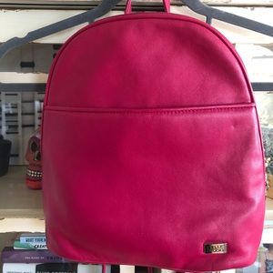 Hot pink genuine leather small backpack.